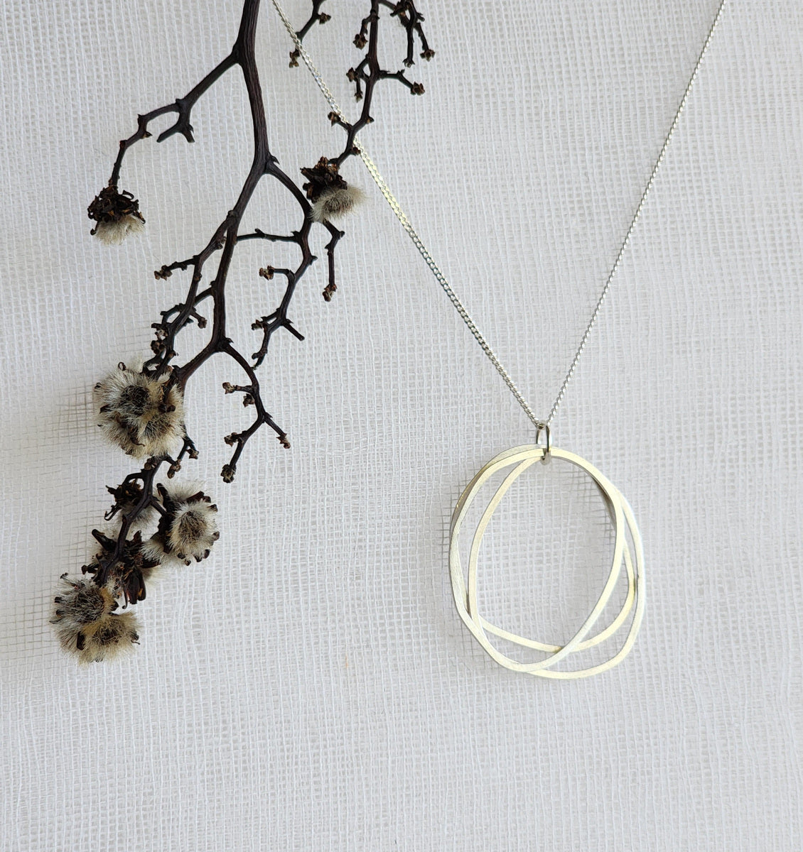 Triple Cycle Necklace