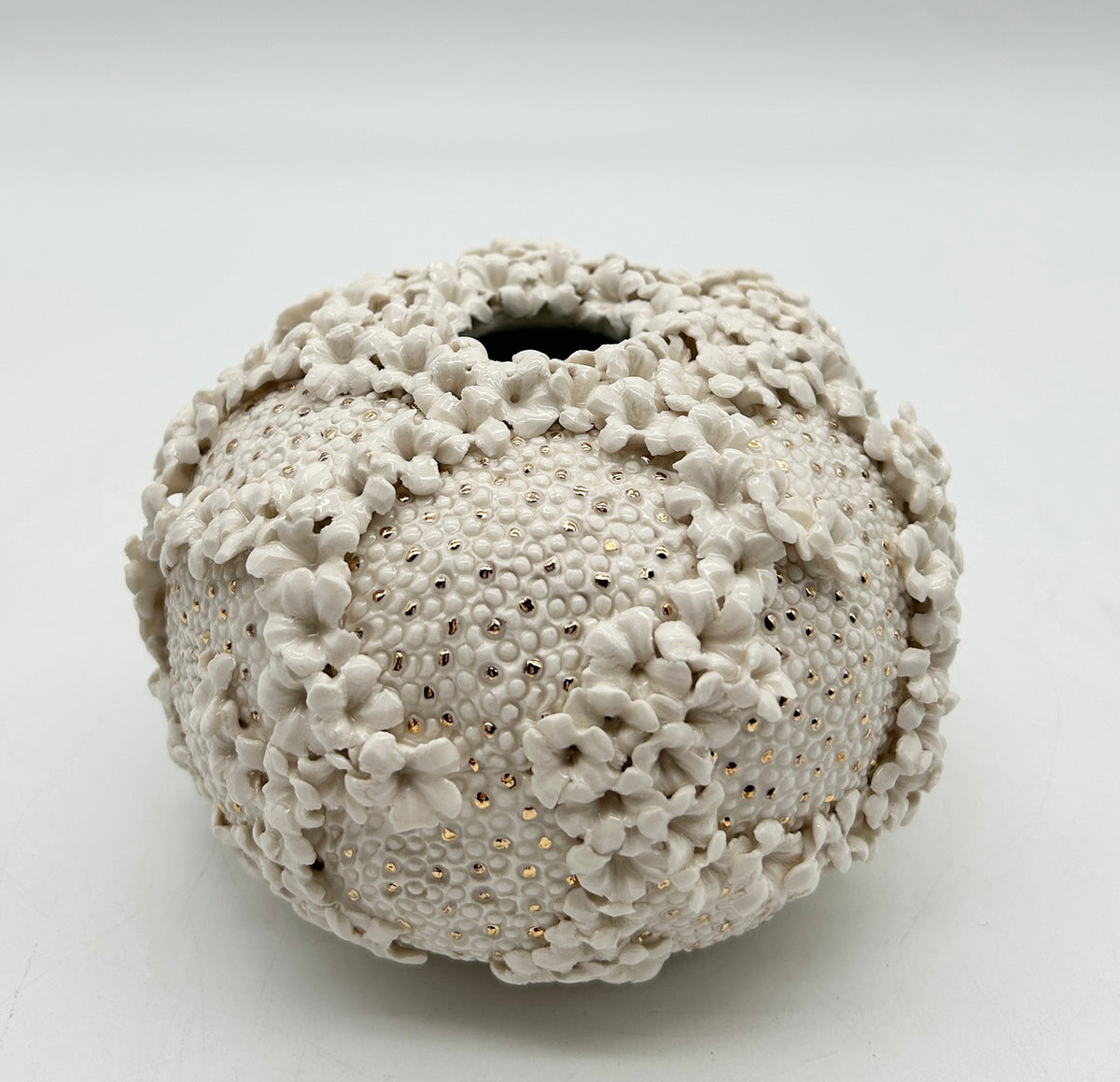 White Porcelain Vessel with Gold Dots