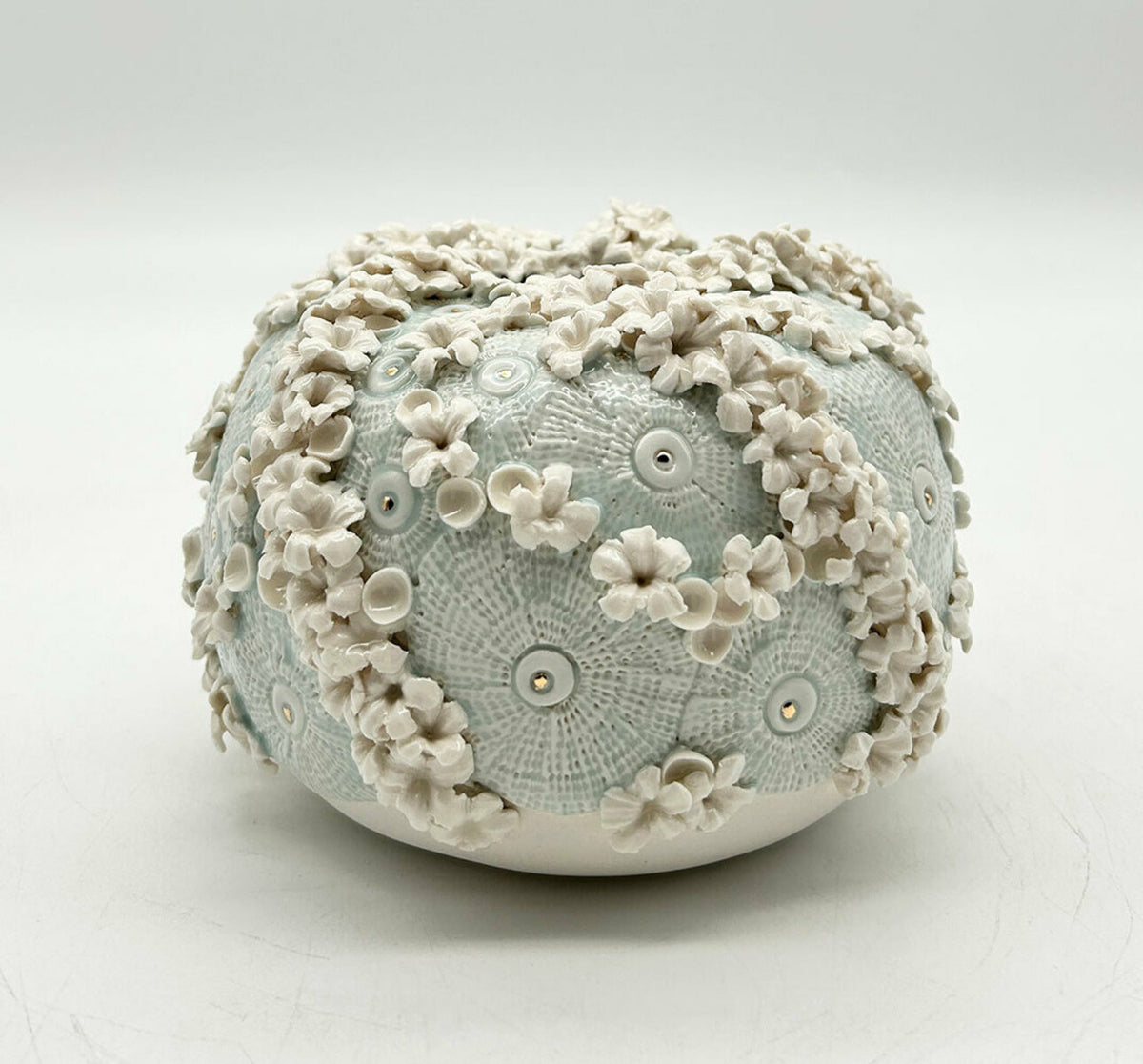 Celadon Round vessel with white flowers