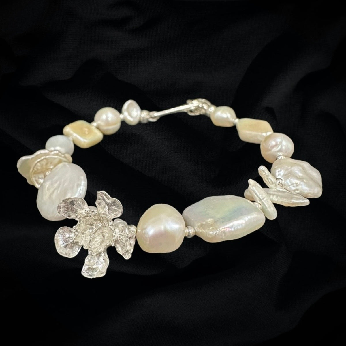 Multi Pearl Bracelet  with Geraldton Wax Flower