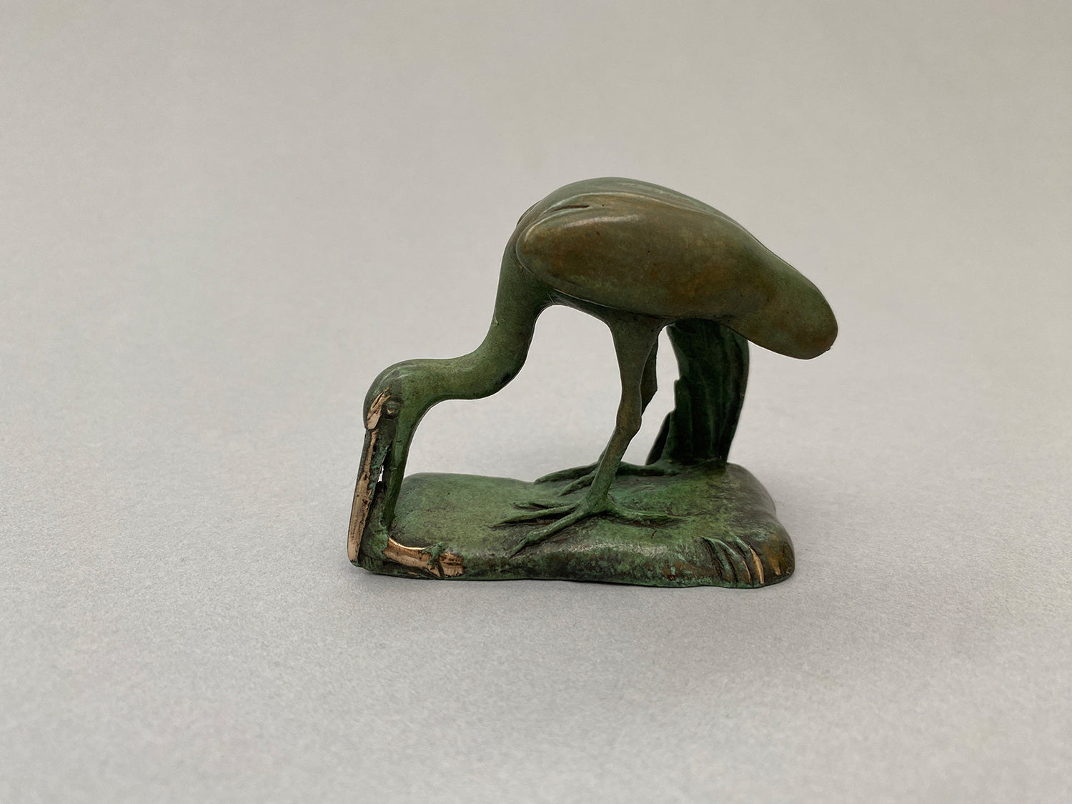 Egret with Fish and Two Frogs