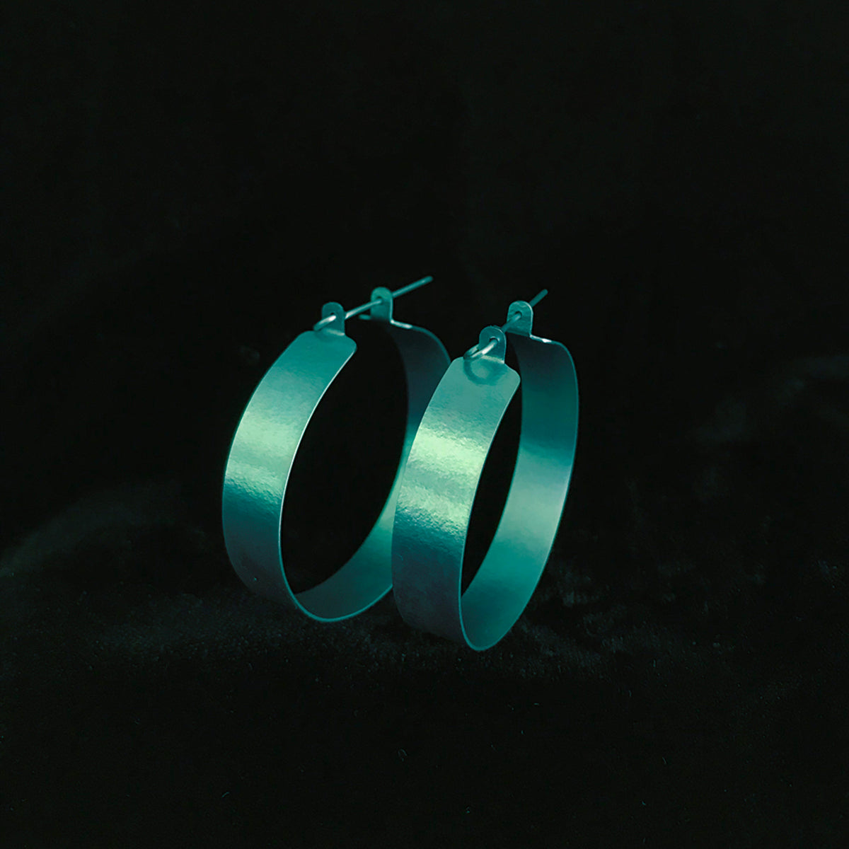 Hoop earrings. Blue green.