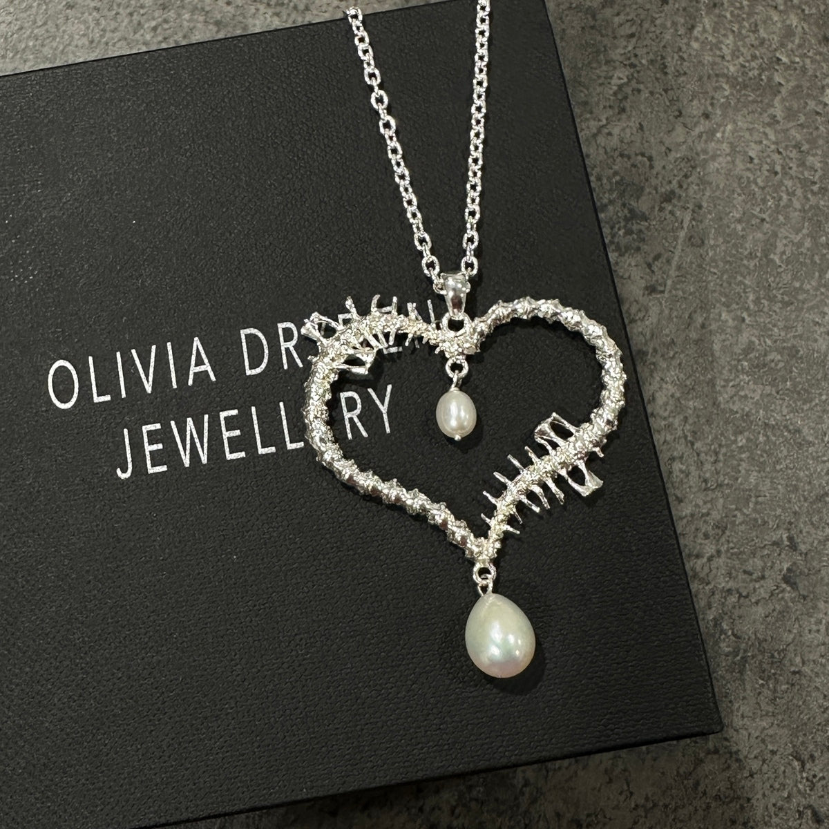 Rat Spine Heart Pendant