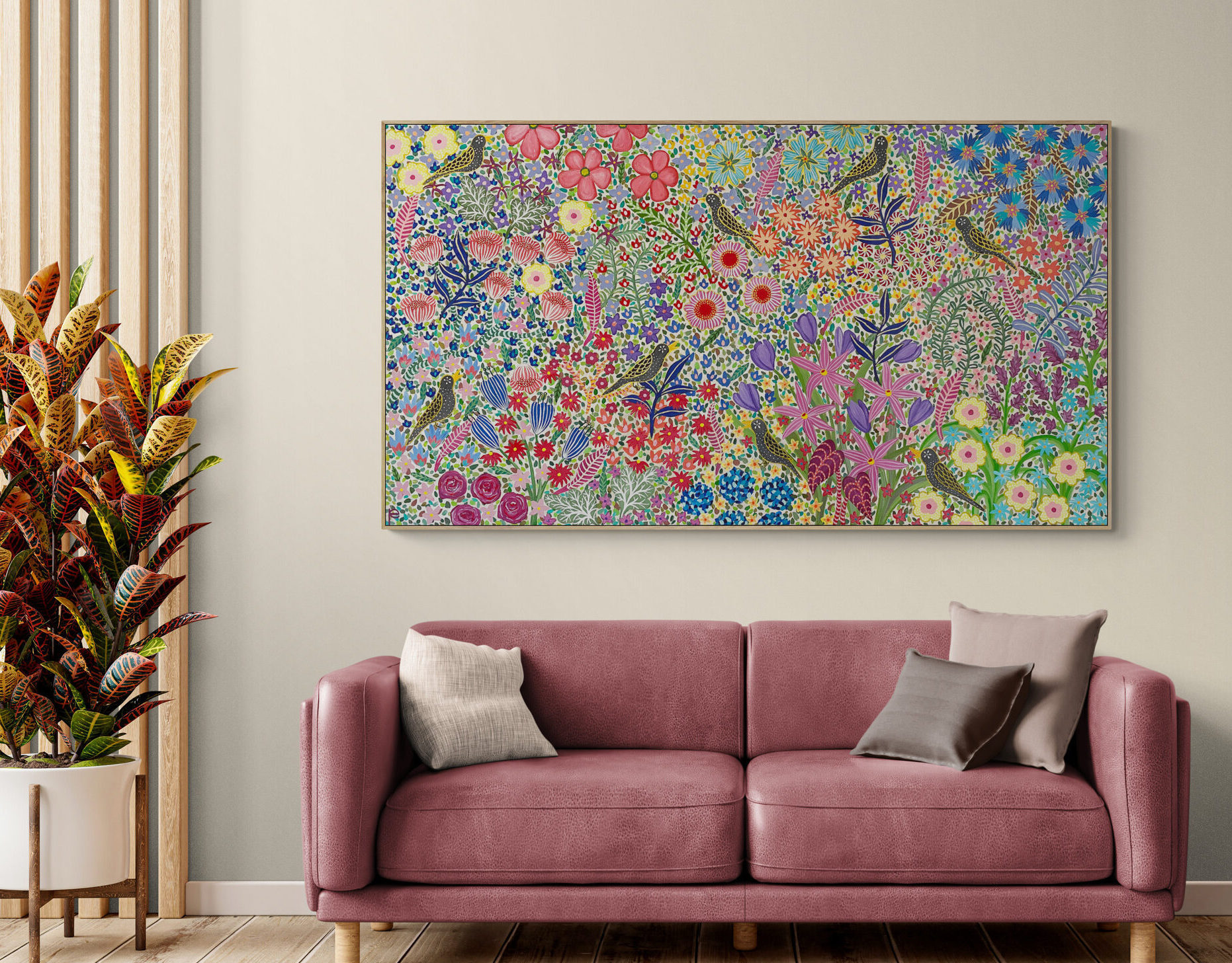floral painting on a wall above couch