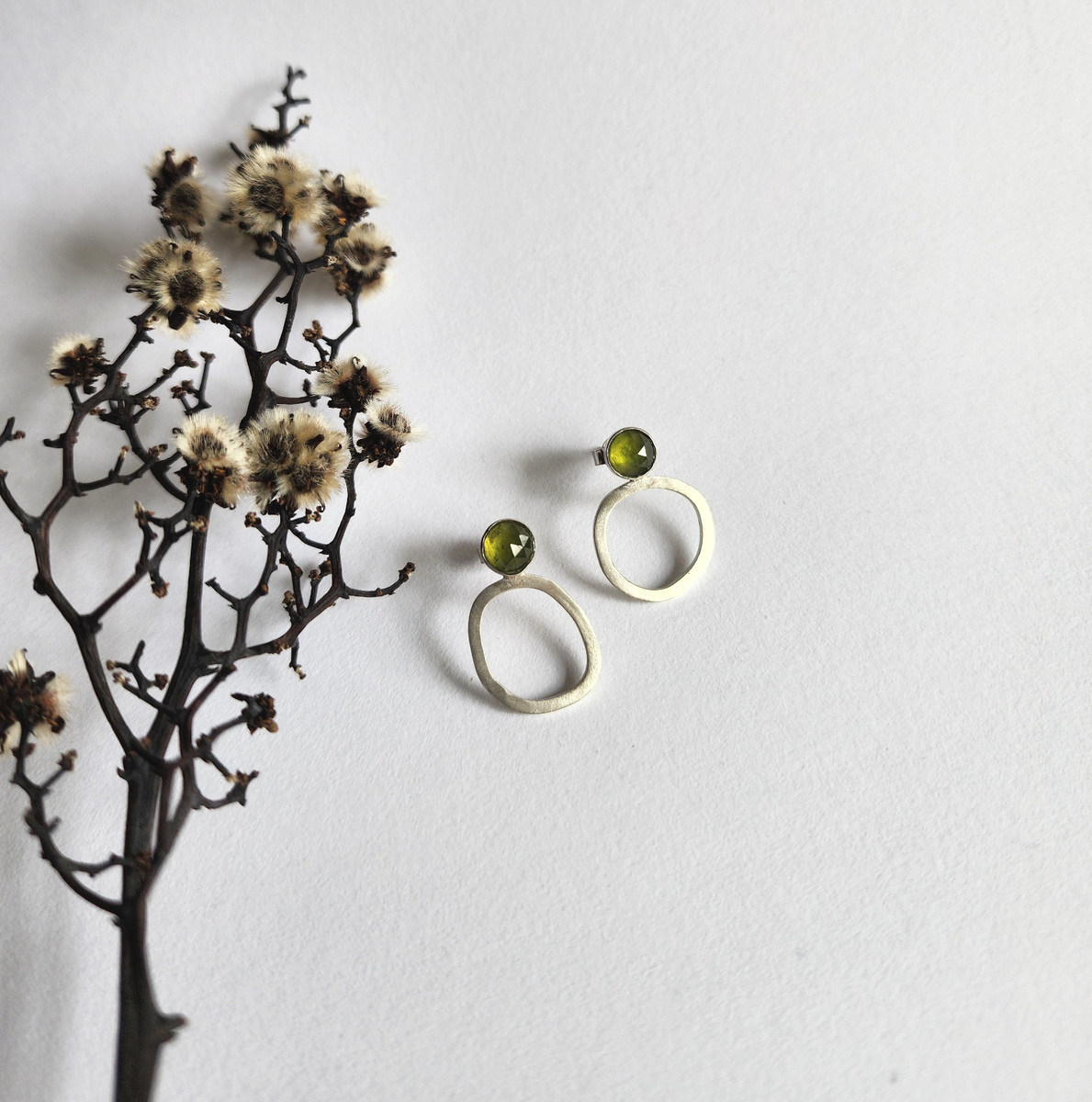 Gemstone Cycle studs with Green Vessonite